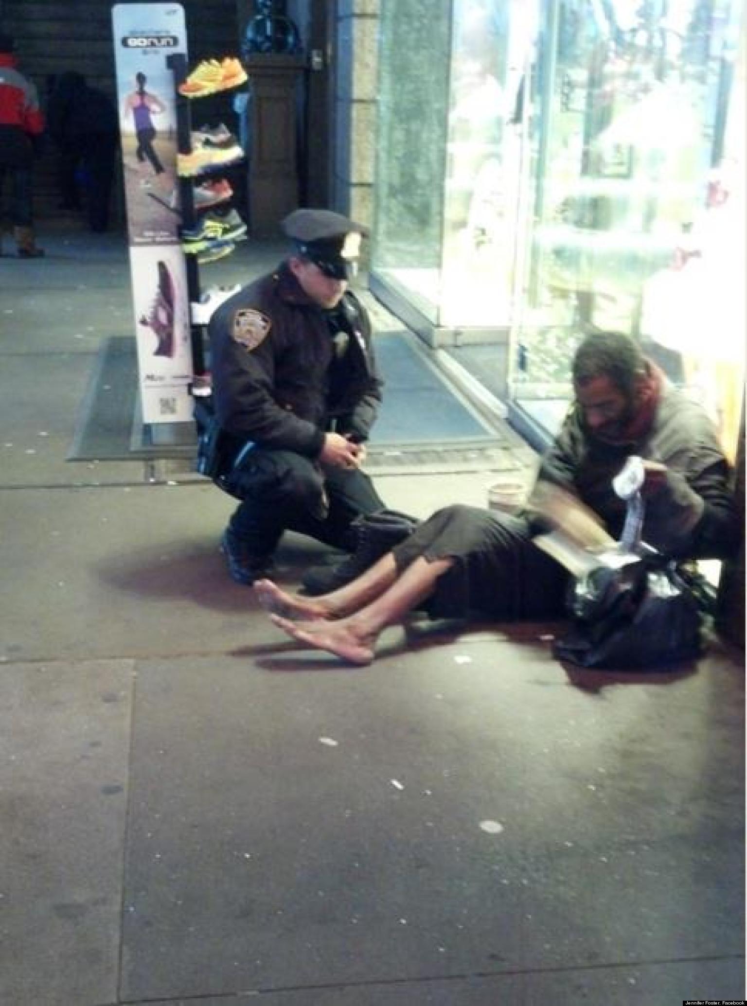 o-NYPD-COP-GIVES-HOMELESS-SHOES-facebook.jpg