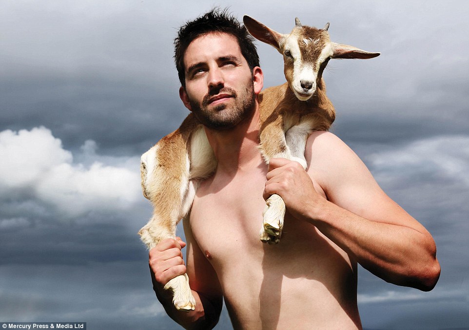 240FC1BD00000578-2874364-Mr_April_shirtless_farmer_Conor_Walsh_uses_a_baby_goat_as_the_pe-a-1_1418655798726.jpg