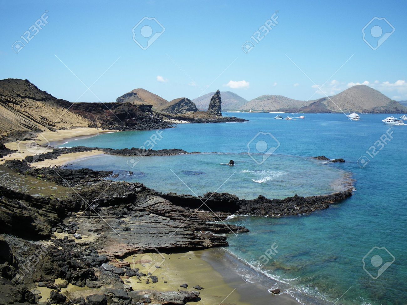6217628-Submerged-volcanic-crater-with-Pinnacle-Rock-in-background-Island-Bartolome-Galapagos-Islands-Ecuado-Stock-Photo.jpg