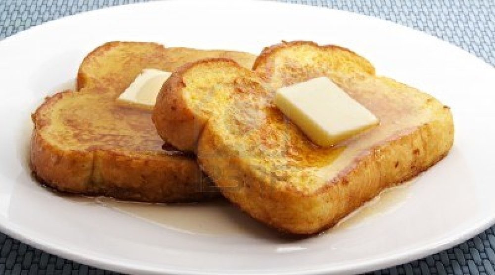 3010876-french-toast-with-piece-of-butter-on-a-white-plate.jpg