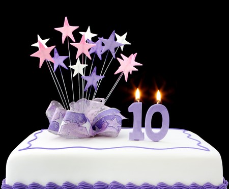 4315725-fancy-cake-with-number-10-candles--decorated-with-star-shapes-and-ribbons-in-pastel-tones.jpg