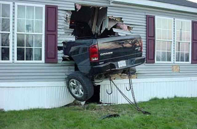 car-accident-pickup-truck-smashed-into-house.jpeg