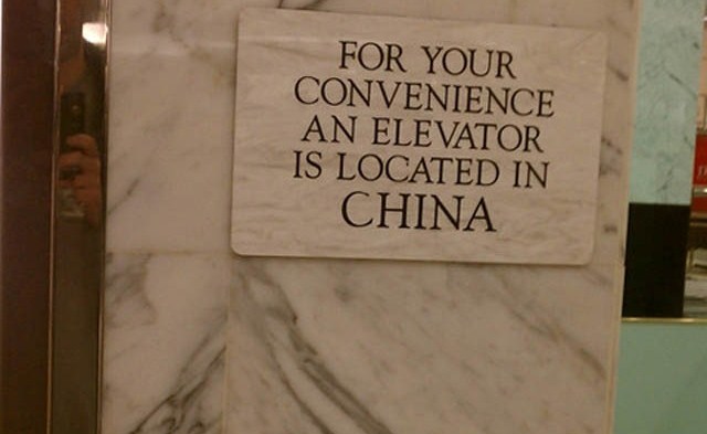bizarre-signs-sign-funny-signs-for-your-convenience-an-elevator-is-located-in-China.jpg