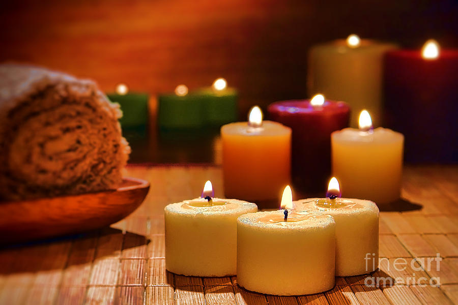 candles-burning-in-a-spa-olivier-le-queinec.jpg