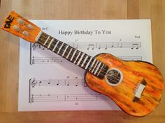 166bc08551eb15e8ab225f8d9642ba00--ukulele-birthday-cakes.jpg