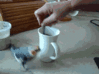 funny-budgie-bird-running-round-cup-animated-gif-pics.gif