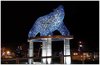 Kelowna bear statue at night.jpg