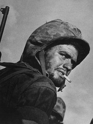 w-eugene-smith-battle-weary-cigarette-smoking-marine-on-saipan-during-fight-to-wrest-the-island-from-japanese.jpg