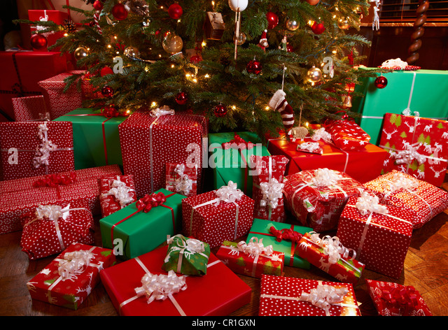 christmas-gifts-under-tree-cr1gxn.jpg