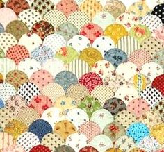 6553e20f6f08f1f303be7fdead497af9--clamshell-quilt-colorful-quilts.jpg