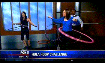 Greg-Kelly-Hits-Rosanna-Scotto-In-Face-With-Hula-Hoop.gif