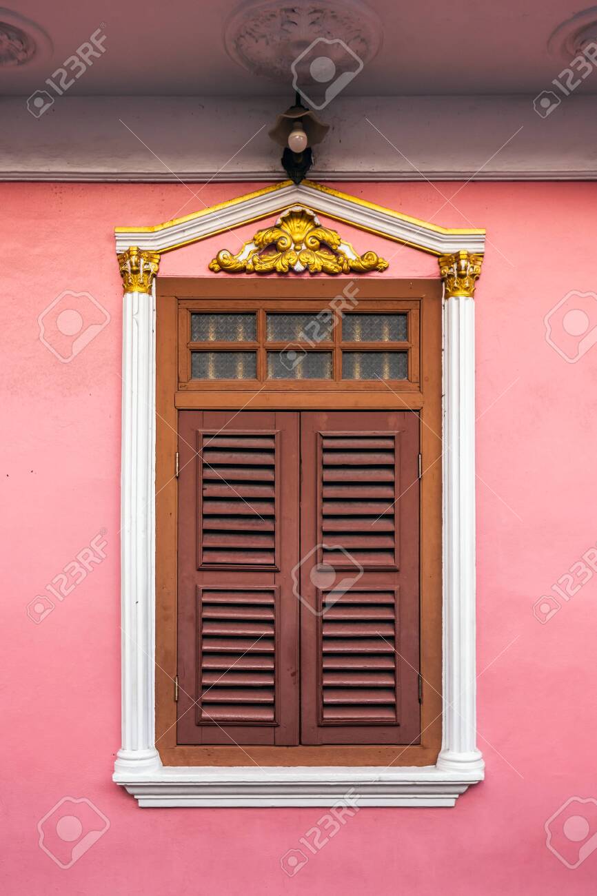 142016244-wooden-shutters-on-the-windows-in-different-shapes-colorful-buildings-in-old-phuket-town-in-thailand.jpg