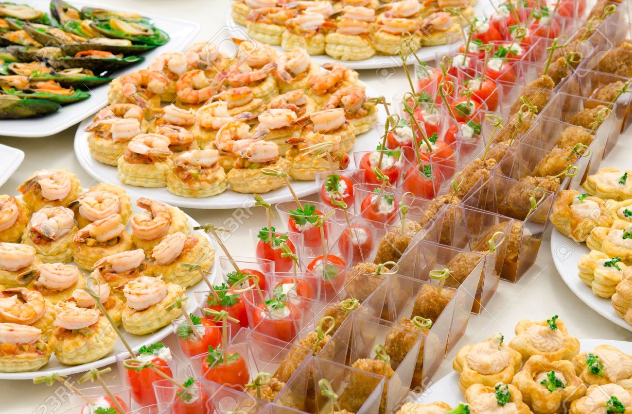 11864578-a-lot-of-cold-snacks-on-buffet-table-catering-Stock-Photo-food.jpg